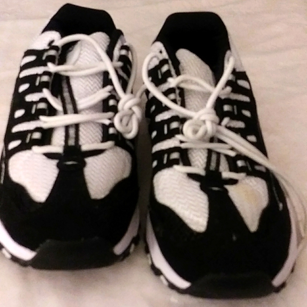 Walking shoes, black and white in color, size 10 wide  Memory Foam.